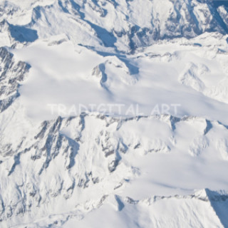 Aerial View of Alps with Peaks Snow Fog