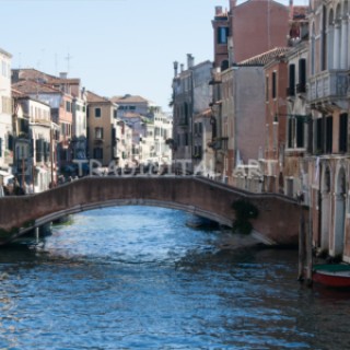 Particular of a Canal with Bridge in Venice Italy